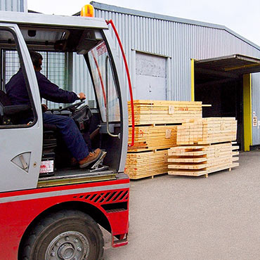 Work at a plywood factory depot