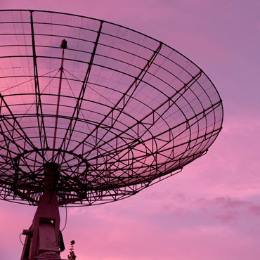 Satellite dish at sunset