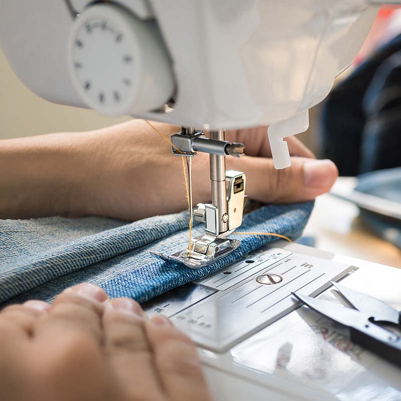 Sewing the hem on a garment