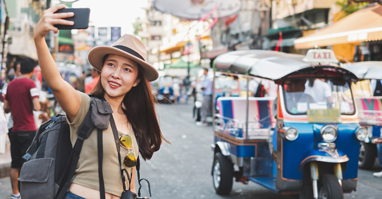 Chinese tourist taking a selfie in Bangkok
