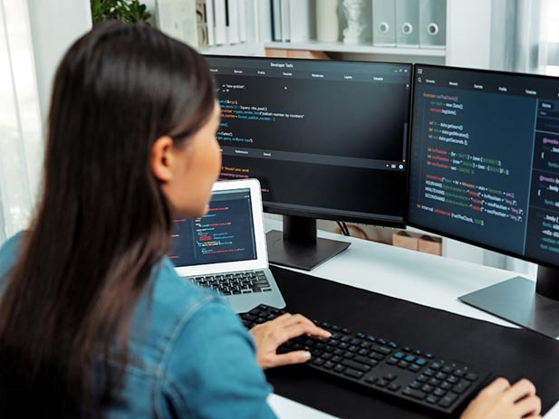 Programmer working on a computer terminal